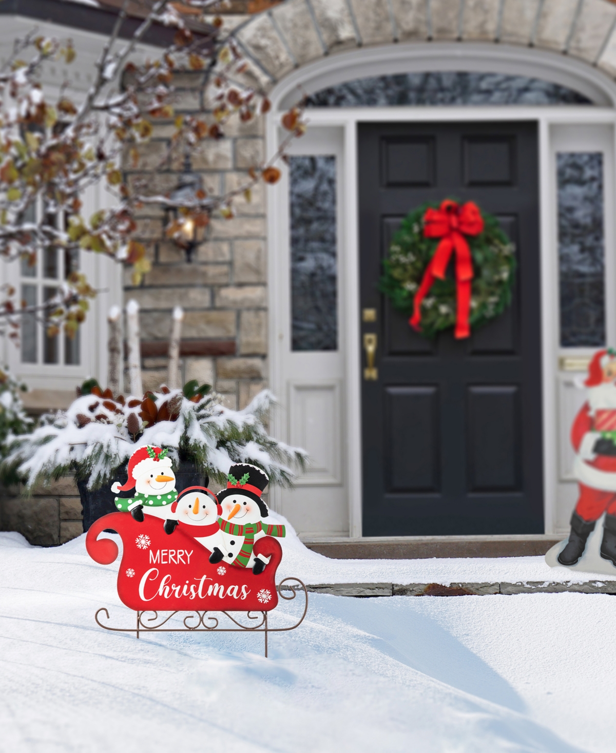 Glitzhome 24" H Metal Snowmen Riding Sleigh Yard Stake In Multi