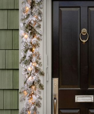 National Tree Company 9' x 12" Feel Real®  Snowy Camden Garland with 50 Clear Lights