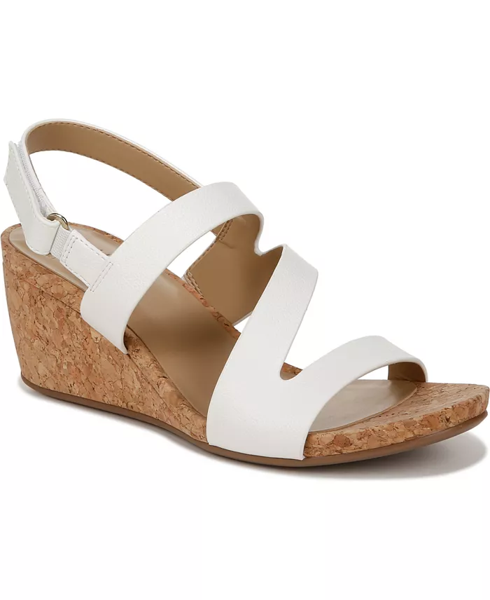 A brown cork and white strapped wedge