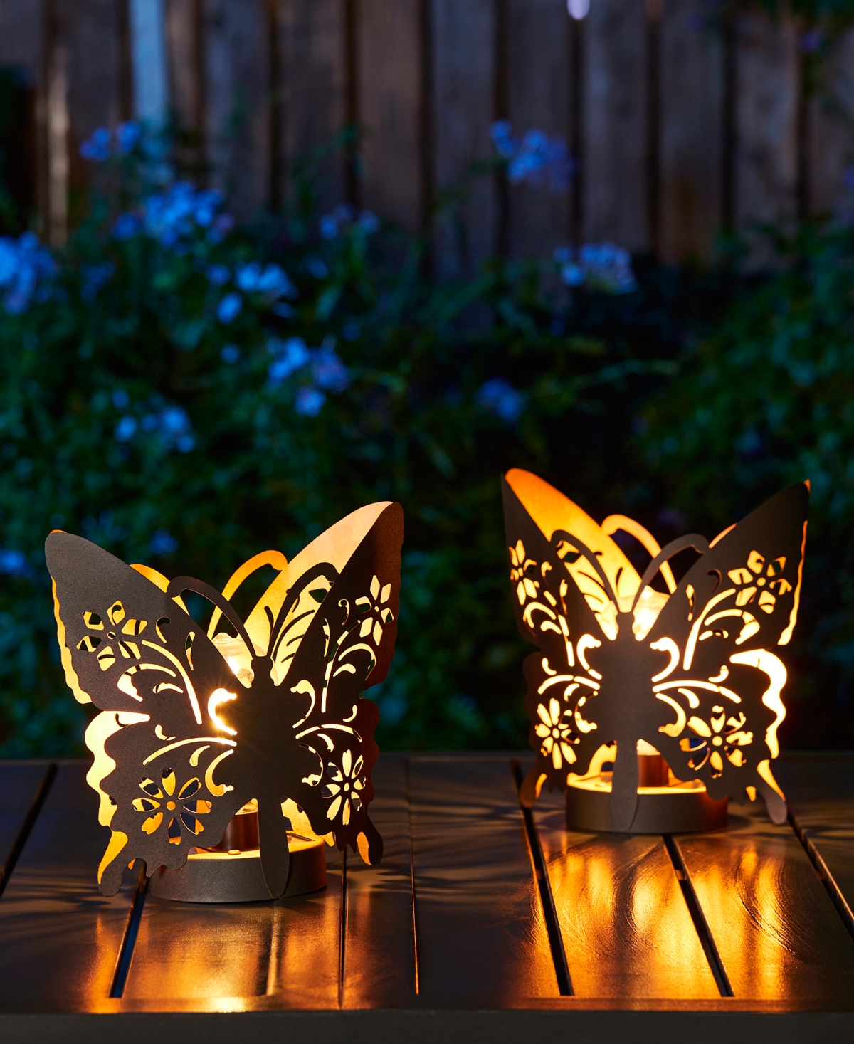 Glitzhome L Set of 2 Black and Gold-Tone Metal Cutout Flying Butterfly Silhouette Solar Powdered Edison Bulb Outdoor Lantern