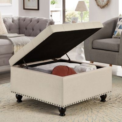 Beige upholstered storage ottoman with wooden legs