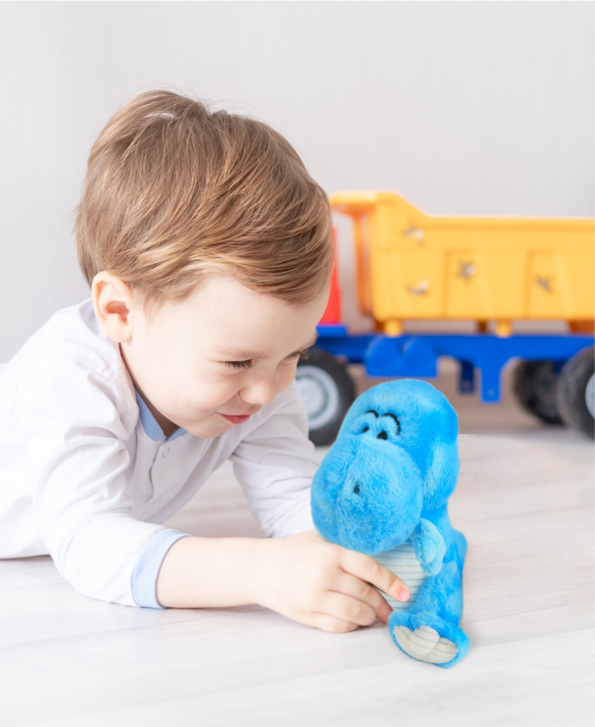 Shop Geoffrey's Toy Box 9" Plush T-rex In Blue