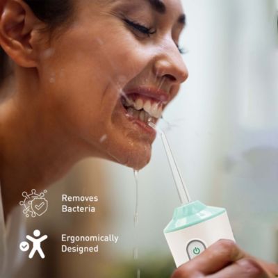 Oral Care Power Bundle: USB Rechargeable Water Flosser,  Electric Toothbrush, and Charcoal Teeth Whitener