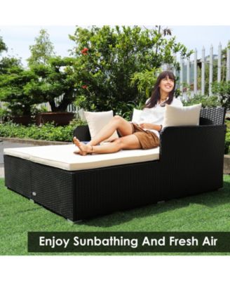 Spacious Outdoor Rattan Daybed with Upholstered Cushions and Pillows