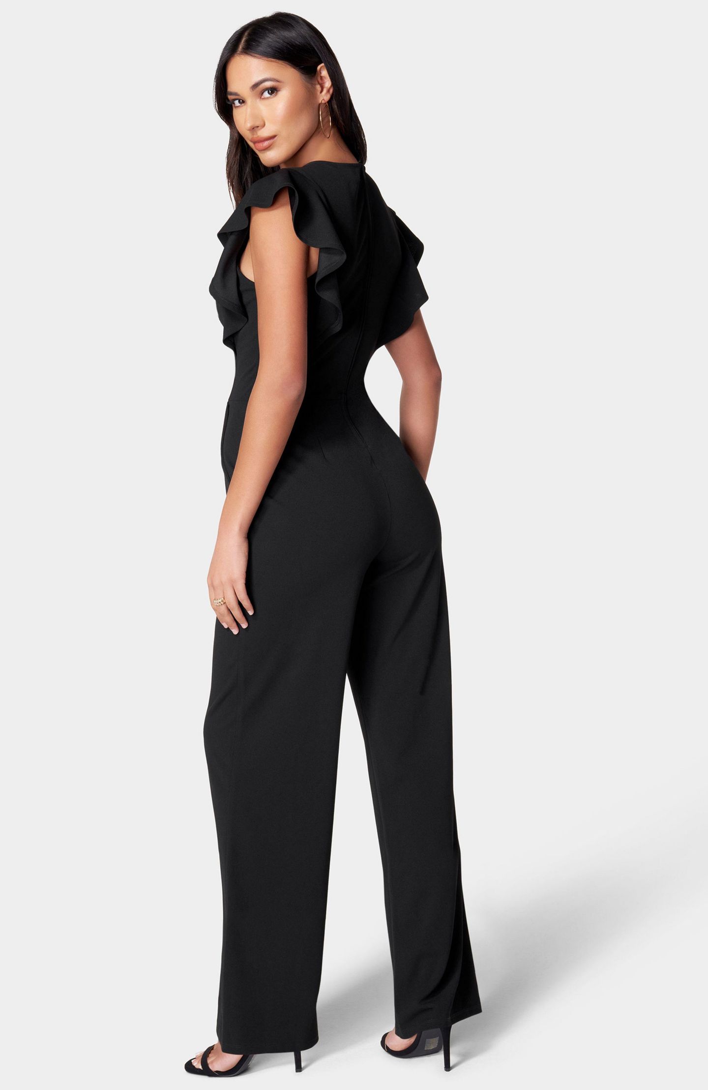 Женский комбинезон Bebe Scuba Crepe Jumpsuit With Ruffle Sleeve, цвет: Чёрный — фото 4