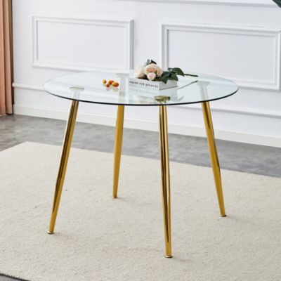 A glass tabletop with a diameter of 40 inches and a modern minimalist circular dining table with gold plated metal legs. 40 ' 40' 30 ' DT-1164