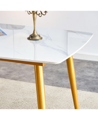 Table and chair set.A morden table with White imitation marble patterned stone burning tabletop with golden metal legs.Paired with 4 chairs with PU leather backrest and black metal legs.