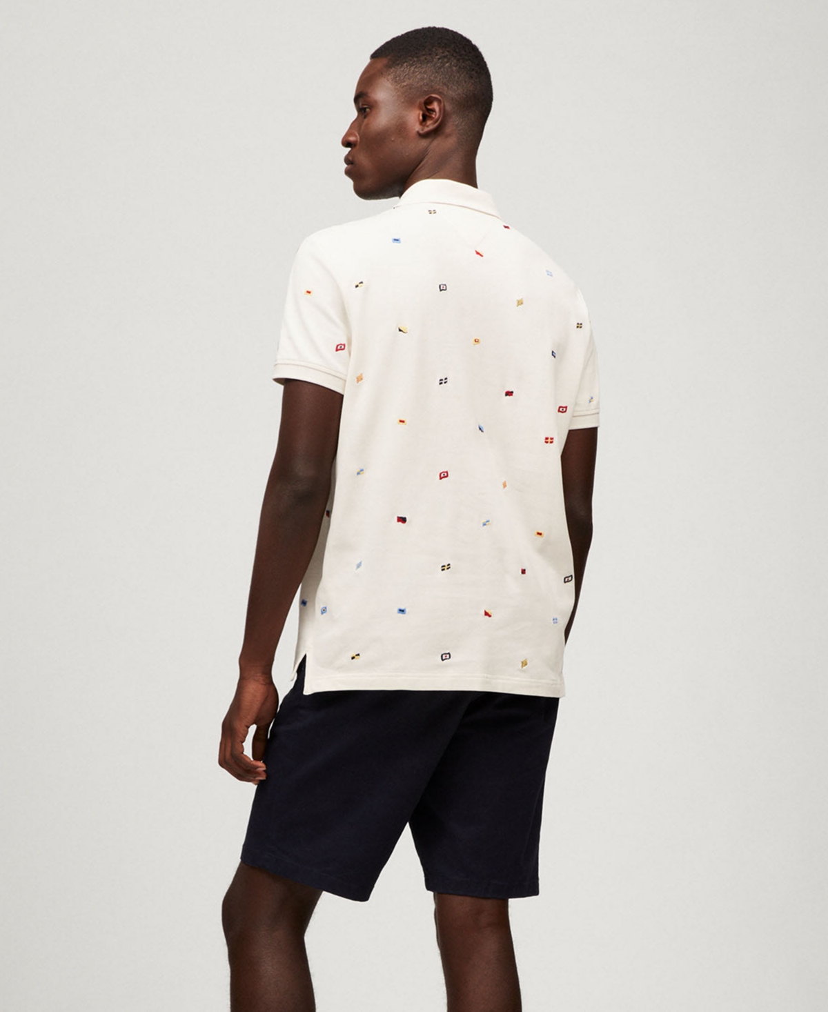 Tommy Hilfiger Men's Regular Fit Allover Flag Polo Shirt In Ivory Petal