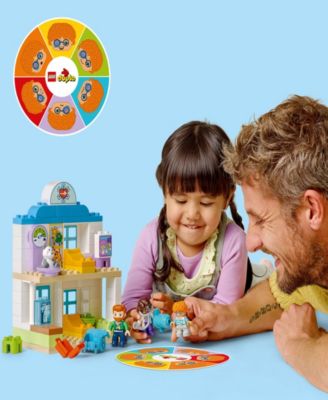 DUPLO Town First Time Visit with the Doctor Office Building Toy Playset 10449, 65 Pieces