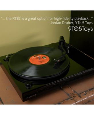RT82 – Walnut high-fidelity turntable with Ortofon OM10 cartridge, speed control motor & vibration-isolation feet.