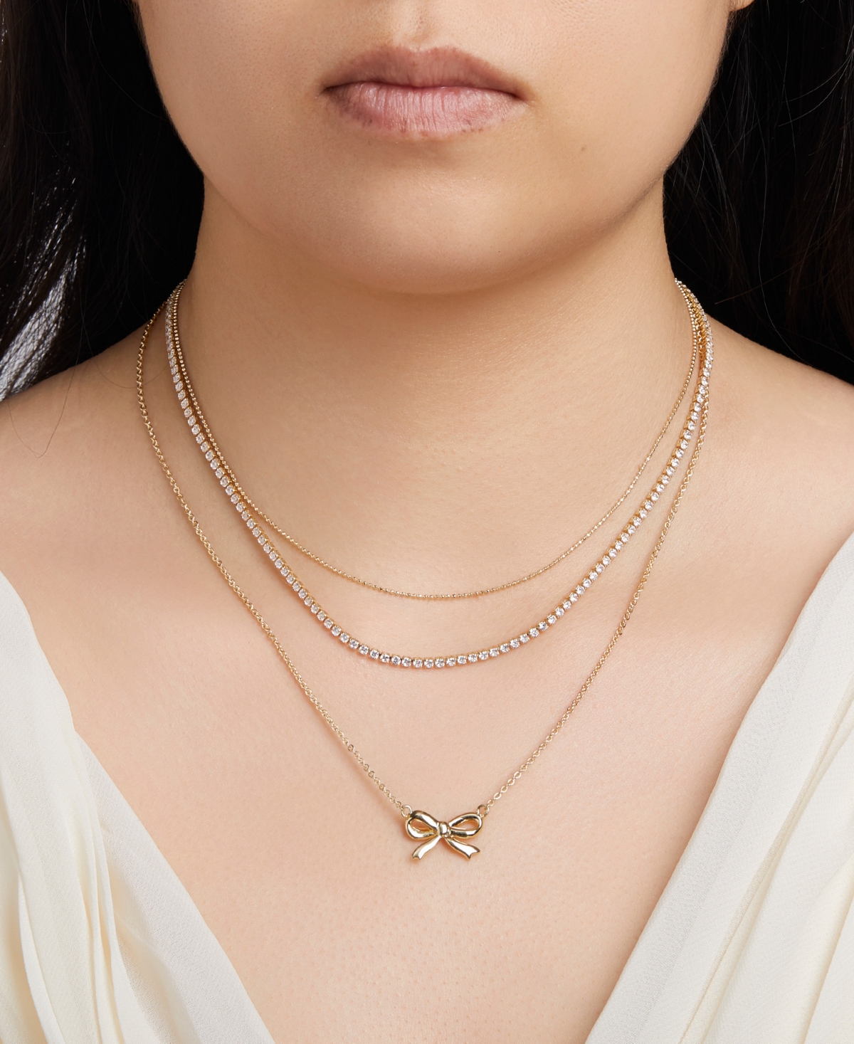 Unwritten Cubic Zirconia Bow Layered Necklace Set In Gold
