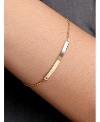 ID Bar Chain Bracelet in , adj to , approx. 3.0 grams.