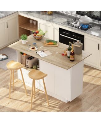 kitchen island with 2 doors, 1 drawer, dining table, coffee station & microwave rack—white wooden design for home or dining room.