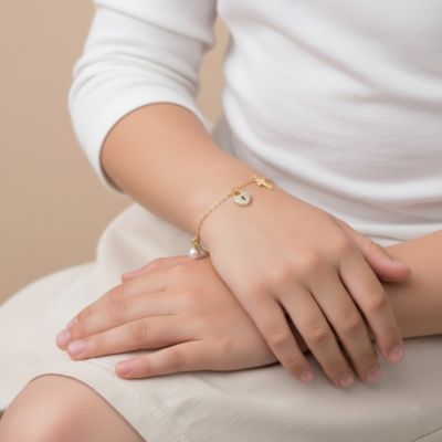 14K Gold Plated with Clear Cubic Zirconia & Mother of Pearl Multiple Charm Bracelet