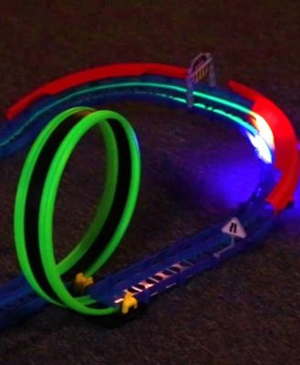 R/C  car and track with three loops and glow trace technology.