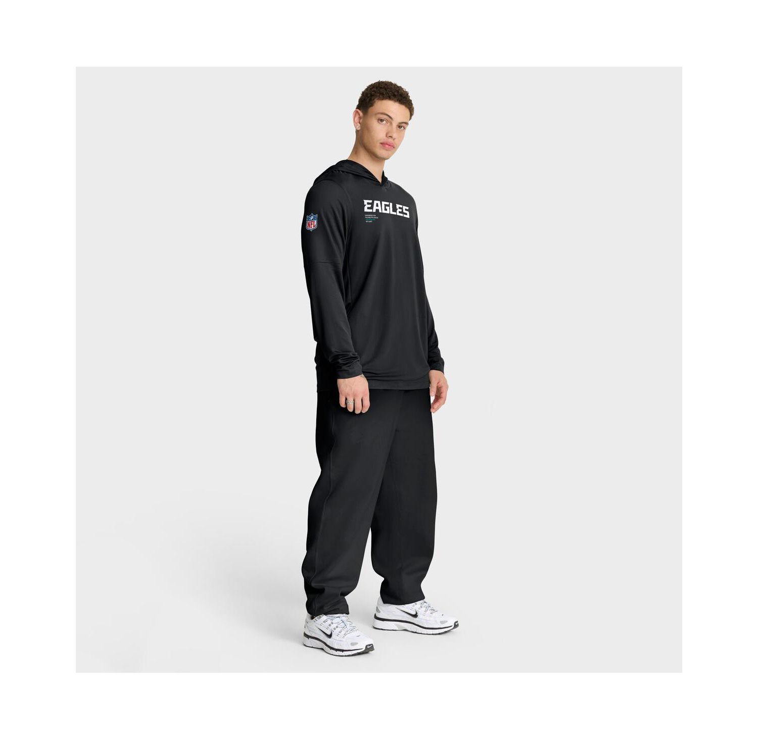 Men's Black Philadelphia Eagles Sideline Pure Fury Performance Long Sleeve Hoodie T-Shirt