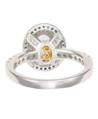 Suzy Levian Sterling Silver Oval Cut Topaz and Sapphire Double Halo Ring