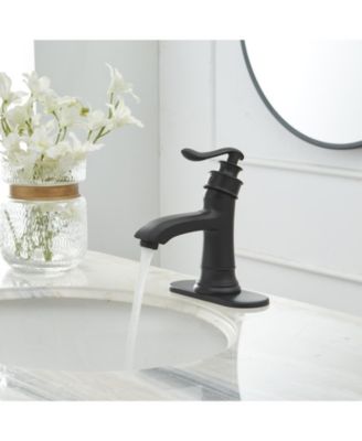 Single Hole Single Handle Low-Arc Bathroom Faucet With Pop-up Drain Assembly in Matte Black