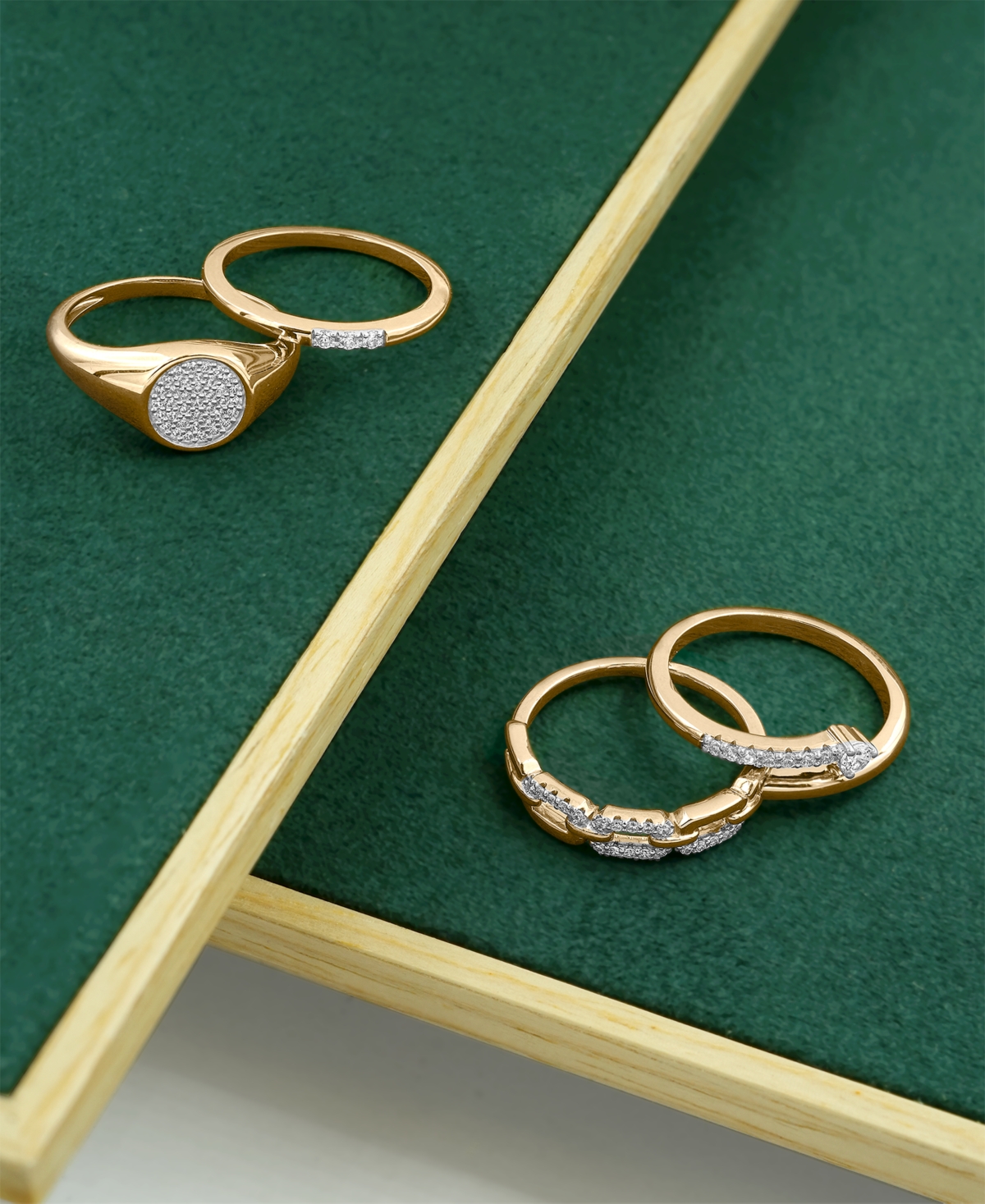 Wrapped Diamond 3-Stone Ring (1/20 ct. t.w.) 10K Yellow Gold with White Rhodium