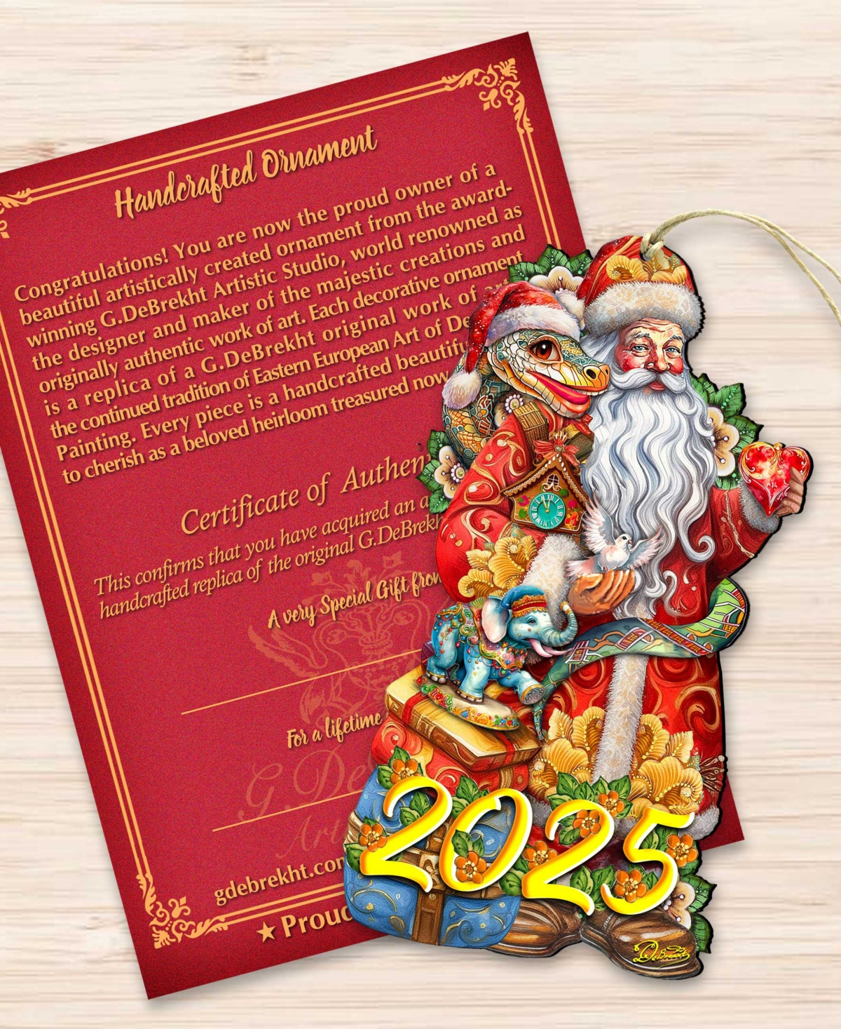 Designocracy 2025 Dated: Santa With Snake Ornament In Multi