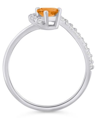 London Blue Topaz (1-1/20 ct. t.w.) and Diamond Ring (1/5 ct. t.w.) in 10k Yellow Gold