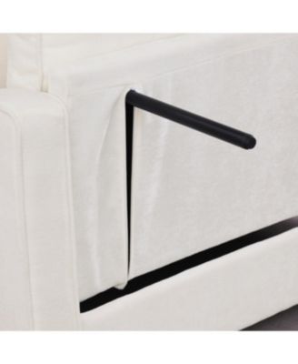 Beige two-seater sofa with chaise, storage footrest, and throw pillows