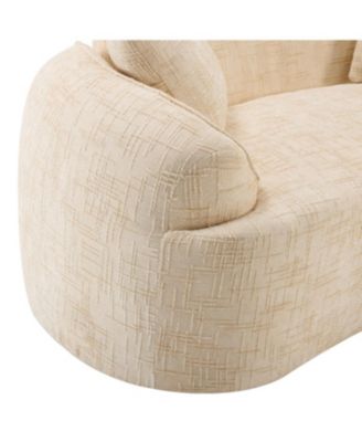 Beige curved two-person compress sofa with armrests and two pillows.