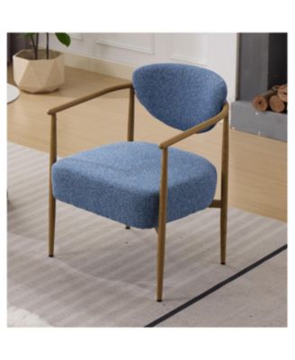 Blue fabric dining/living/bedroom chair with metal frame, wood grain visual.