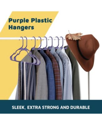 heavy-duty plastic hangers with non-slip grooves, space-saving design, and 5 lb capacity ideal for clothes $ dresses. Pack of 10, purple.