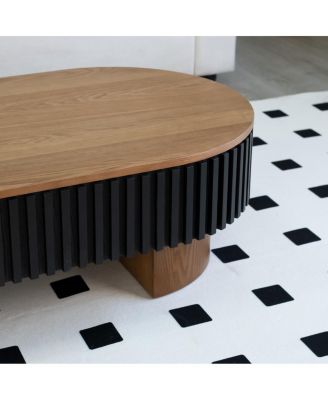 Elliptical coffee table with storage