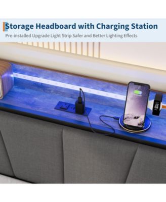 "Metal twin daybed with trundle, LED lights, upholstered headboard, and charging station."