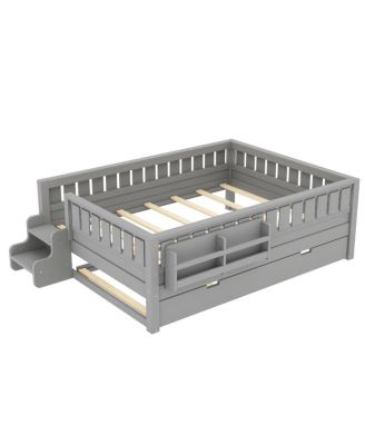 Full bed with bookshelves, staircase, safety rails, trundle