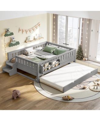 Full bed with bookshelves, staircase, safety rails, trundle