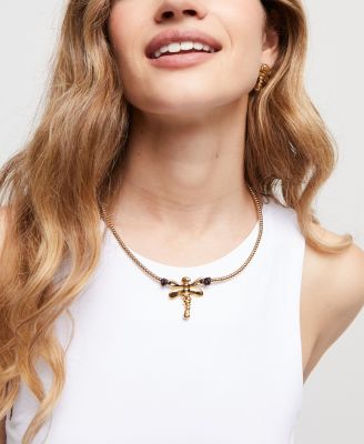 short necklace of 18k gold plated metal alloy with dragonfly and handcrafted blue crystals