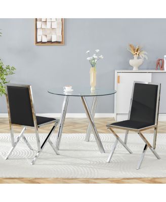 2-pack Black PU dining chairs with silver metal legs.