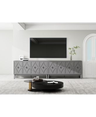 Vintage 4-door cabinet with hand-carved geometric doors and adjustable shelves