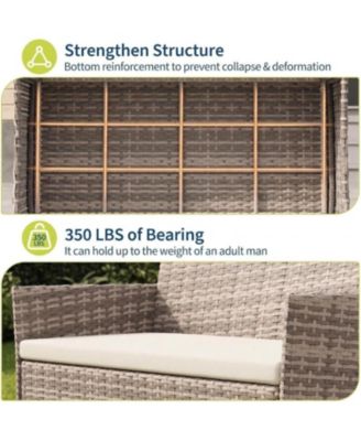 4-Piece Rattan Patio Furniture Set with Upholstered Sofa and Coffee Table