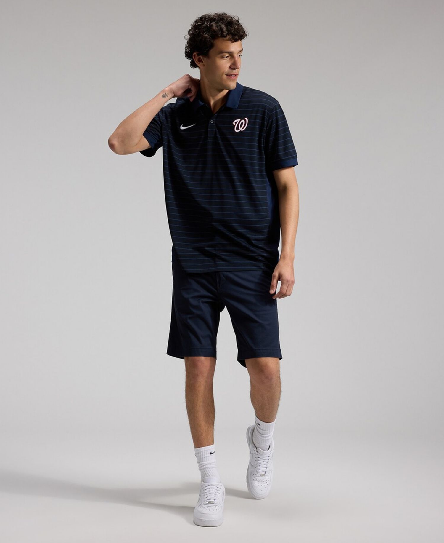 Men's Navy Washington Nationals Authentic Collection Striped Victory Dri-FIT Polo Shirt