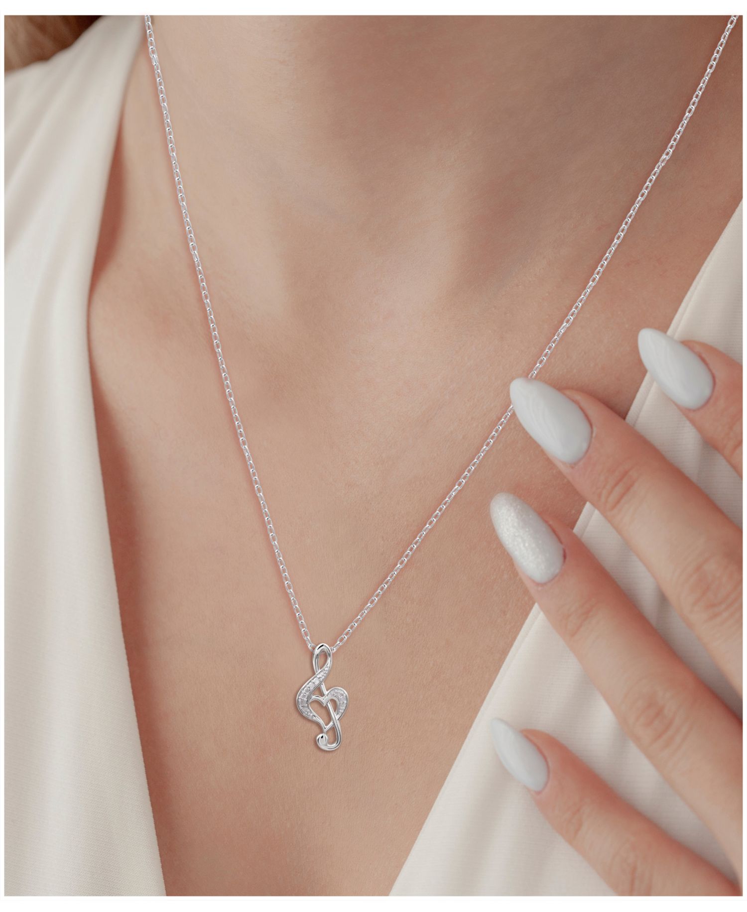 Diamond Treble Clef Heart Pendant Necklace in Sterling Silver (1/10 ct. t.w.)