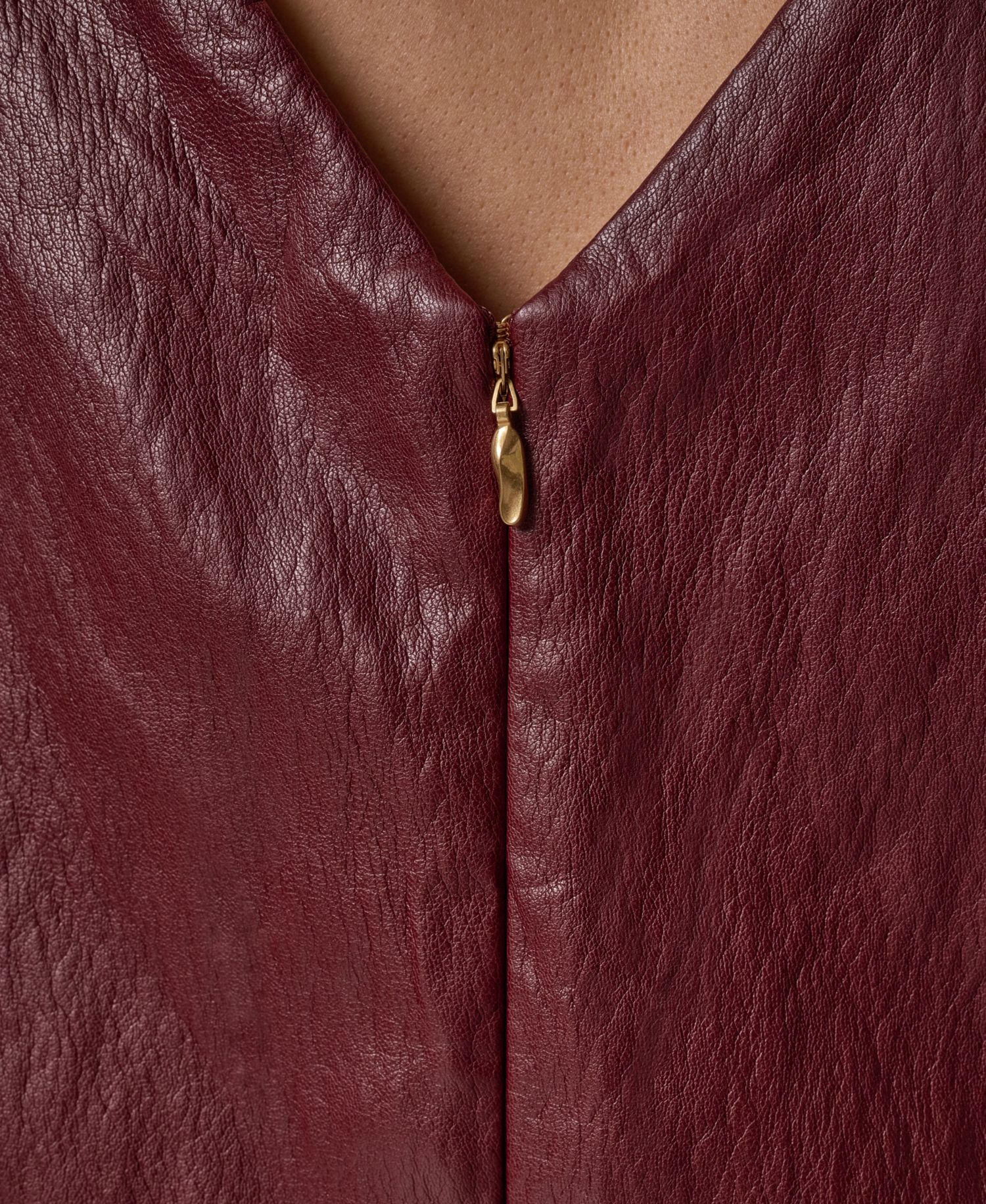Women's Faux-Leather Sleeveless V-Back Blouse