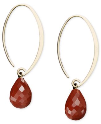 Macy's - 14k Gold Earrings, Red Jasper Sweep EarringsLiven up any look with a bright pop of color. A sweep of 14k gold highlights a faceted turquoise drop (7-3/8mm). Approximate drop: 1-1/2 inches.