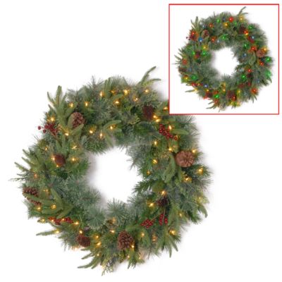 National Tree Company - National Tree 24" Feel Real(R) Colonial Wreath with 8 Pine Cones, 8 Red Berries and 50 Dual Color (R) Battery Operated LED Lights w/Timer-9 Functions