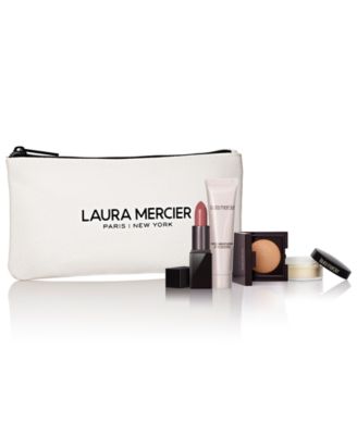 Laura Mercier - Receive complimentary makeup pouch and 4 deluxe miniatures with your $75  Purchase