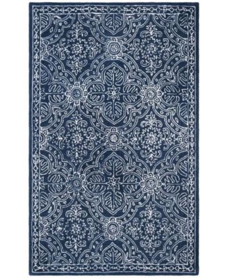 Etienne LRL6603N Navy and Ivory Area Rug Collection