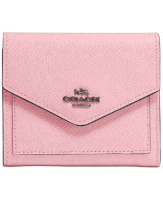 coach small pink wristlet