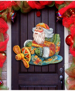 Designocracy Santa On The Airplane Christmas Door Hanger In Multi