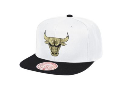 white and gold bulls hat