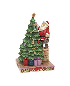 Santa Decorating Tree Figurine