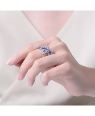 Sterling Silver Rhodium Plated with Blue Cubic Zirconia Criss-Cross Ring