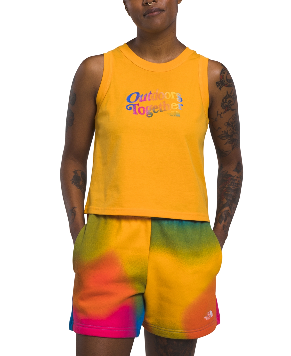 The North Face Women's Cotton Pride Graphic Tank Top In Summit Gold